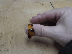 Fingerpick für Daumen